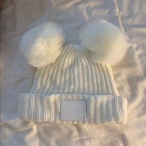 White knitted double Pom hat
